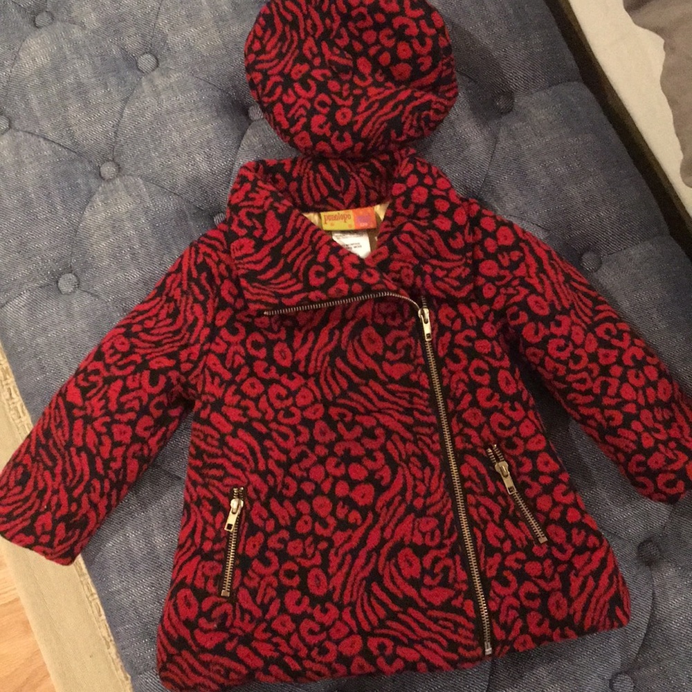 Red wild print coat with matching beret.